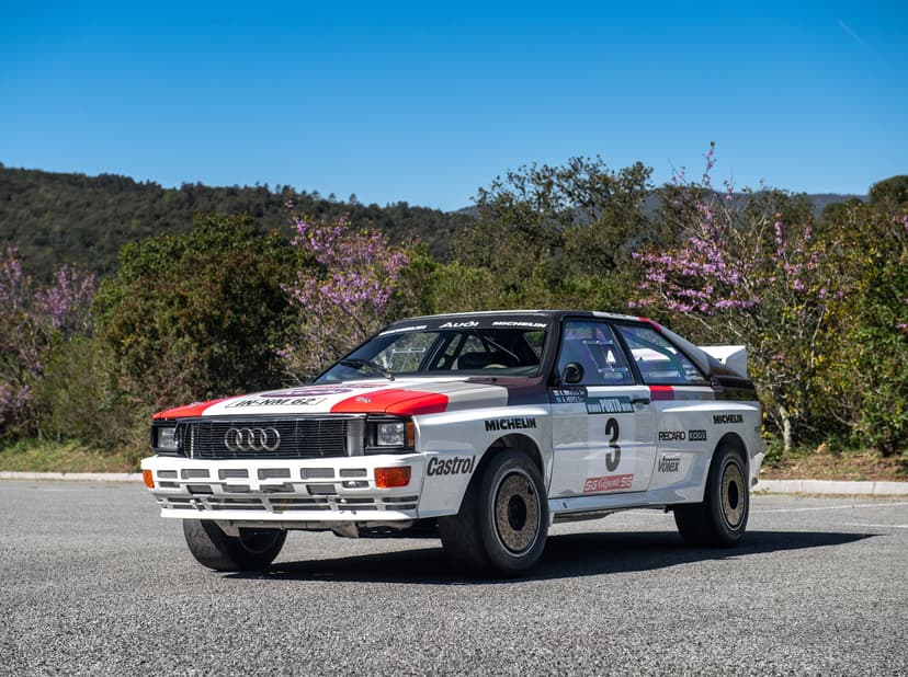 A works rally car at speed